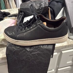 Black leather Ugg casual shoes. Extremely comfortable and barely worn